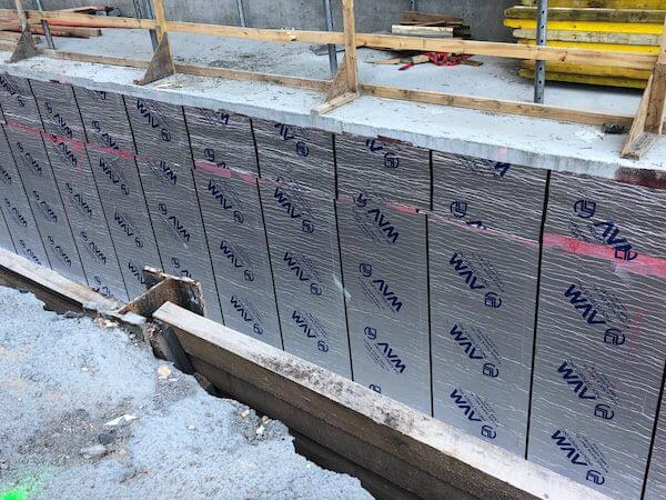 Rolls of Aussie Mate 580-AL Waterproofing being installed