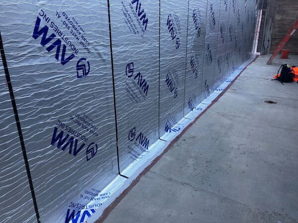 Rolls of Aussie Mate 580-AL Waterproofing being installed