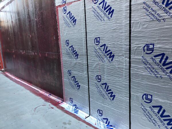 Rolls of Aussie Mate 580-AL Waterproofing being installed