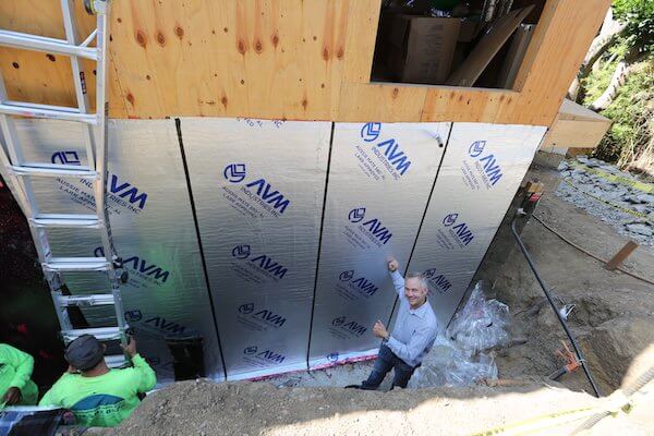Rolls of Aussie Mate 580-AL Waterproofing being installed