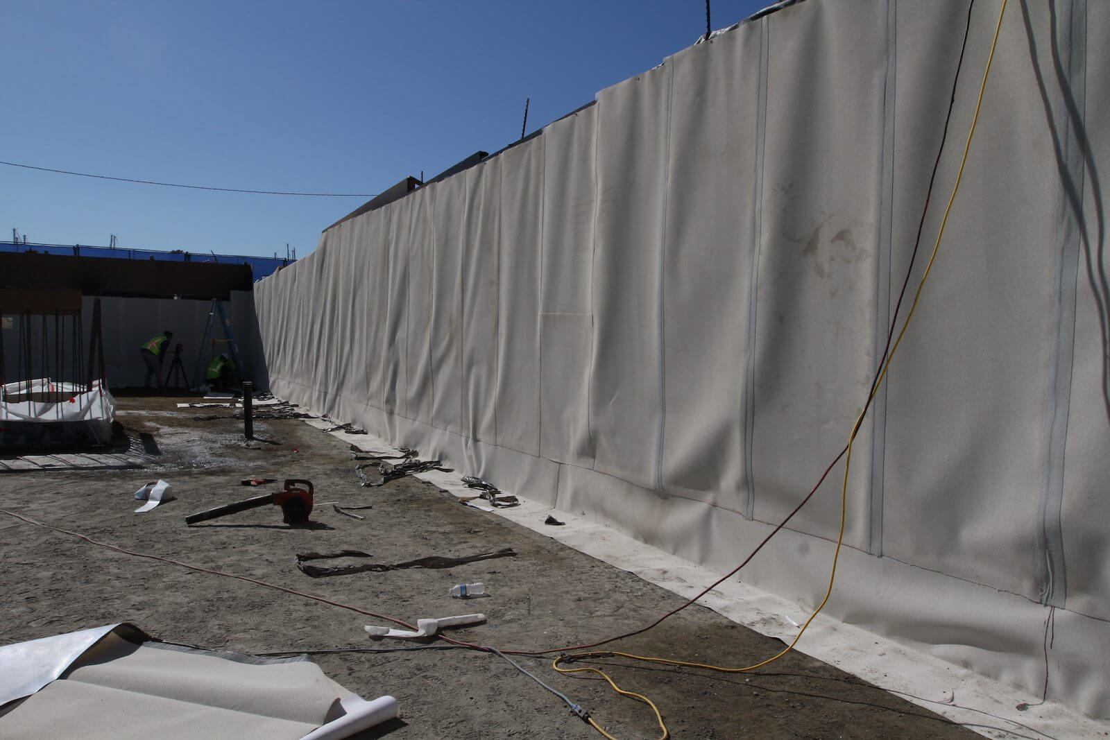 Aussie Skin 550G waterproofing system installed on below-grade foundation wall