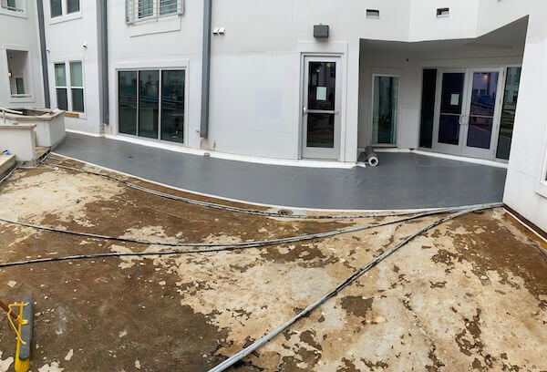 Aussie tite laid out at building entrance