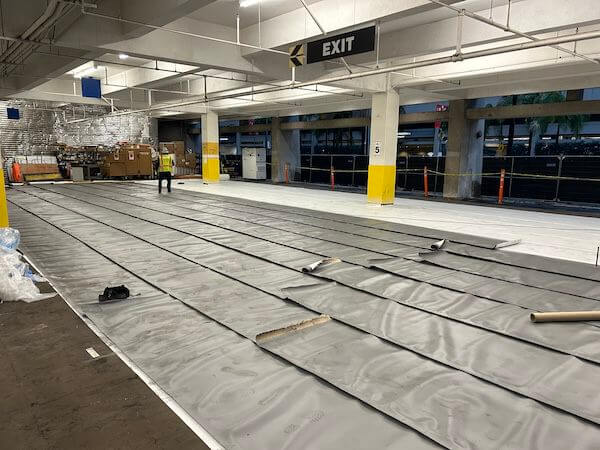 parking garage ground covered in Aussie Tite