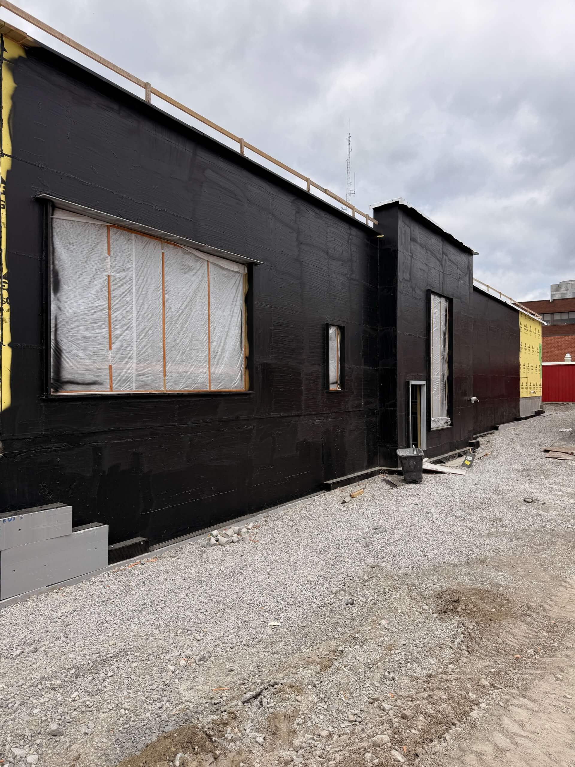 AVM Aussie Shield™ 300 fluid-applied air barrier installed on exterior sheathing at commercial jobsite